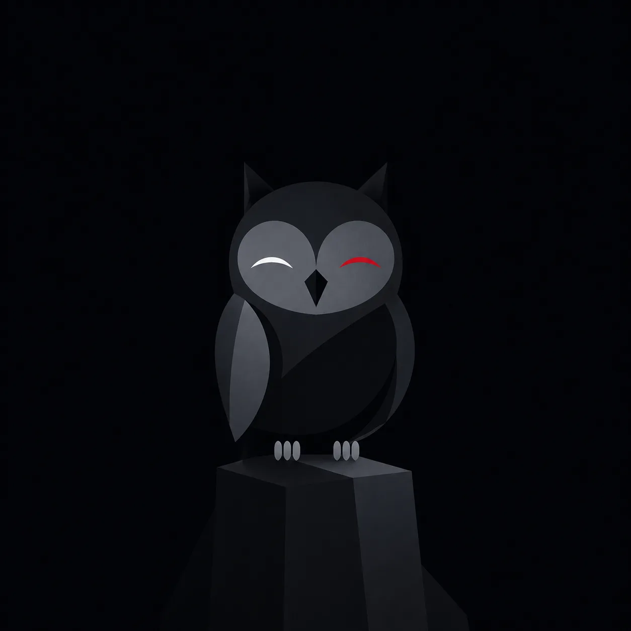 The owl sitting still with calm, closed eyes.